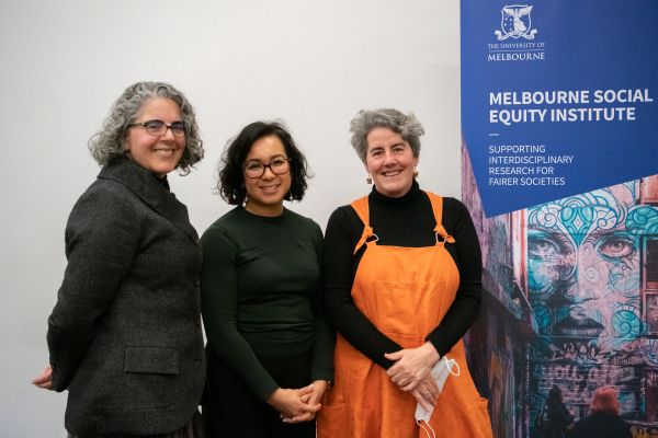 Photograph of Jo Barraket, Charlene Edwards and Robin Banks with an MSEI banner in the background