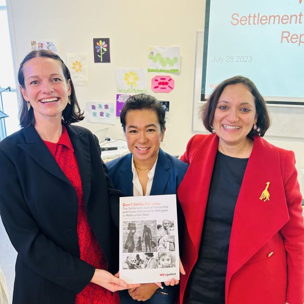 Photo of Tess Matthews, Charlene Edwards and Rachna Madaan-Bowman posing for a photo with a copy of the Don't Settle for Less.