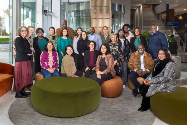 Group photo of the Community Fellows, mentors and friends