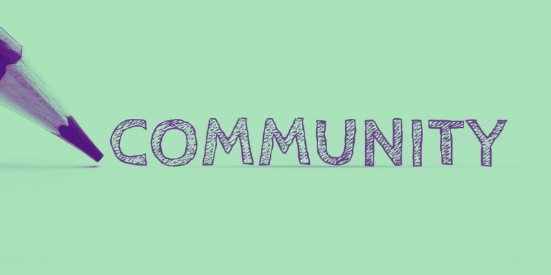 Stock graphic of a pencil with the word Community in large letters
