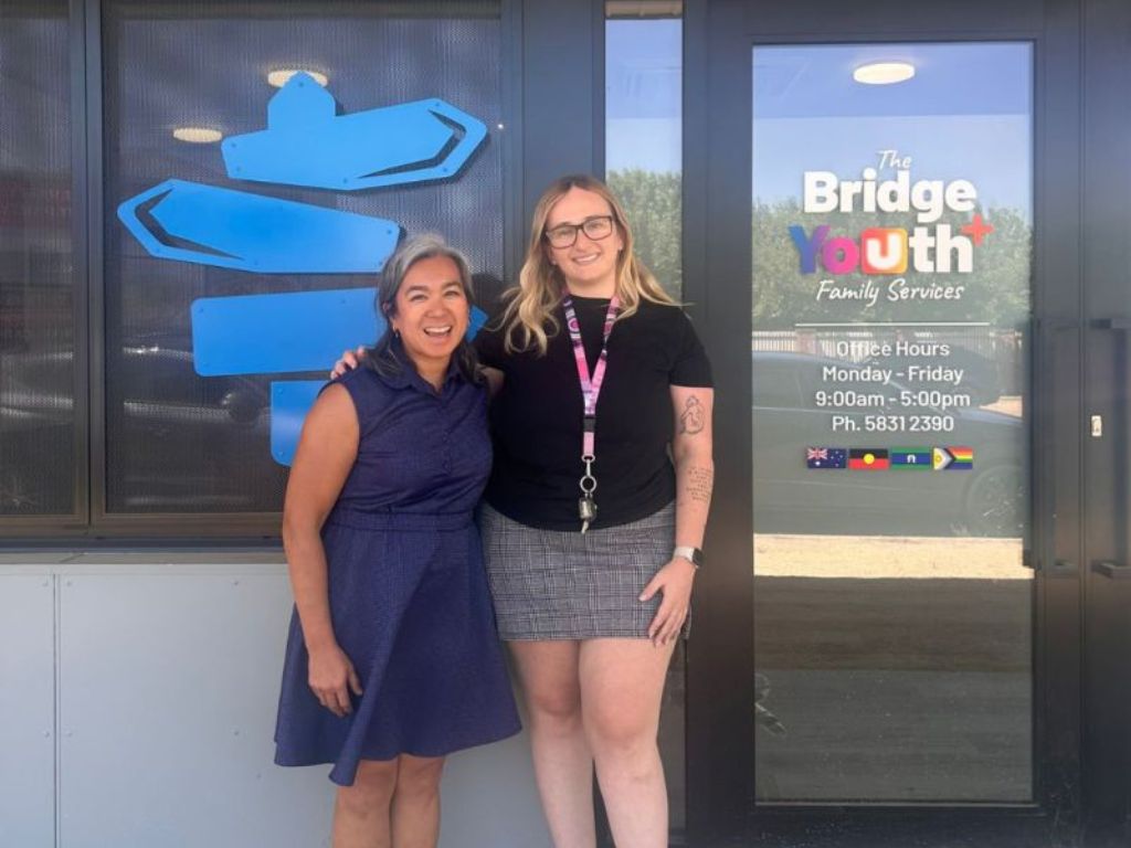 Charlene and Hayley laughing outside The Bridge's office