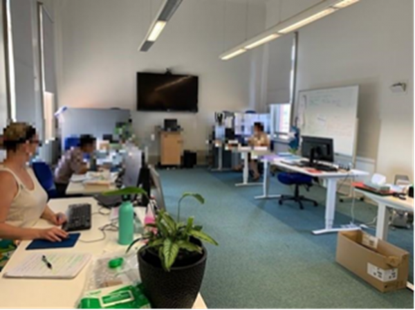 A busy palliative care service shared office space for clinicians.